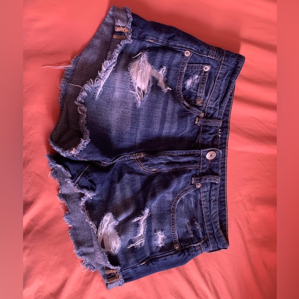 ripped blue jean shorts